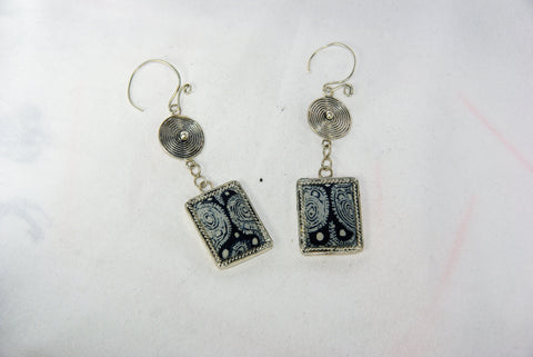 Rectangular small earrings with tribal charm reversed